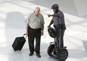 Officer talking to patron